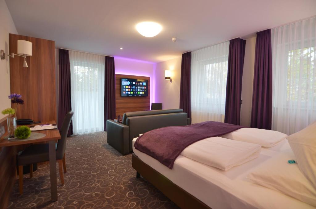 Postel nebo postele na pokoji v ubytování Wohlfühl-Hotel Neu Heidelberg