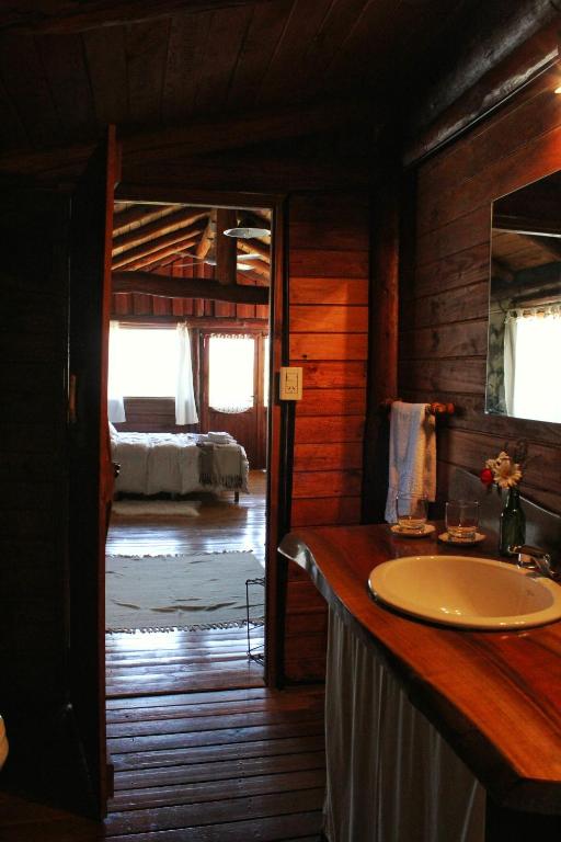 Voodi või voodid majutusasutuse Criollo Lodge toas
