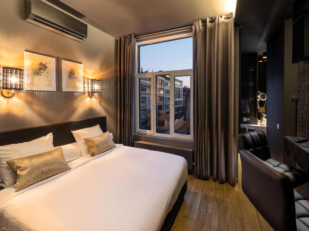 Postel nebo postele na pokoji v ubytování Hotel Goodnight Antwerp