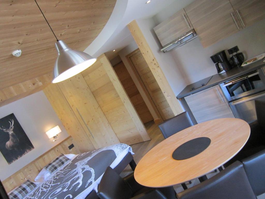 Kuchyň nebo kuchyňský kout v ubytování Logis Hotel Gai Soleil