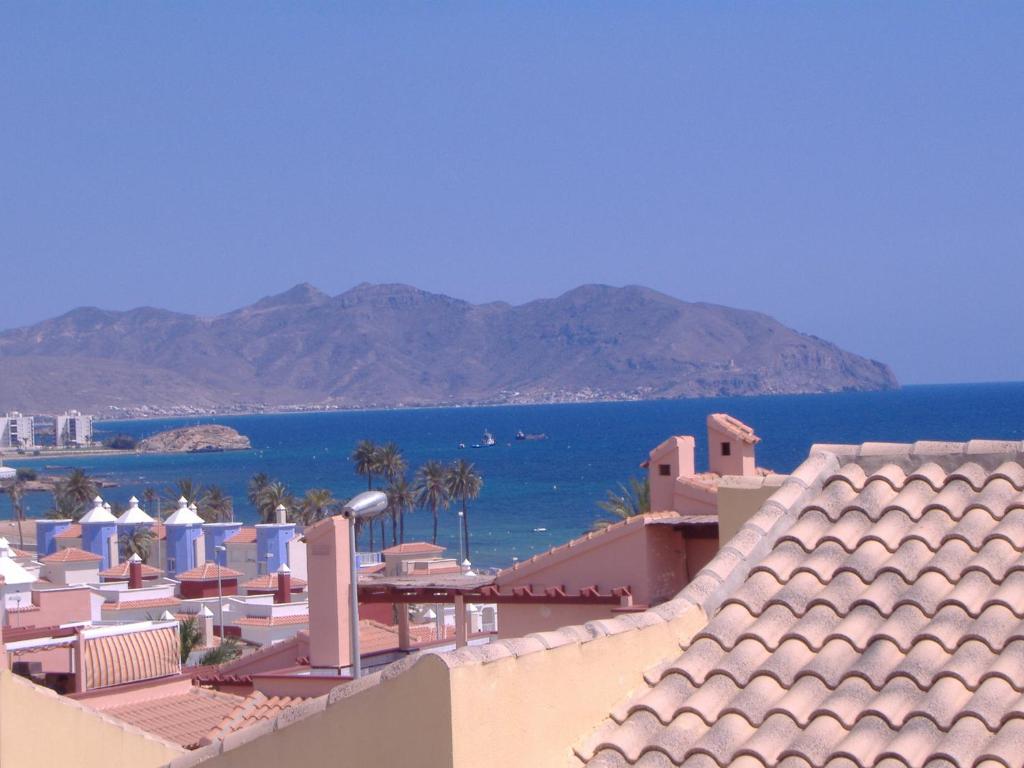 a view of the ocean from the roof of a building at Casa Margarete Puerto de Mazarron in Puerto de Mazarrón