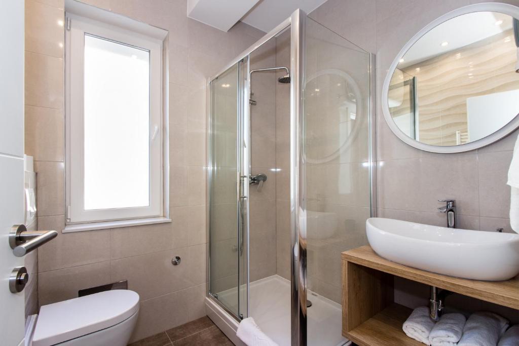 Kúpeľňa v ubytovaní Lugo Apartments
