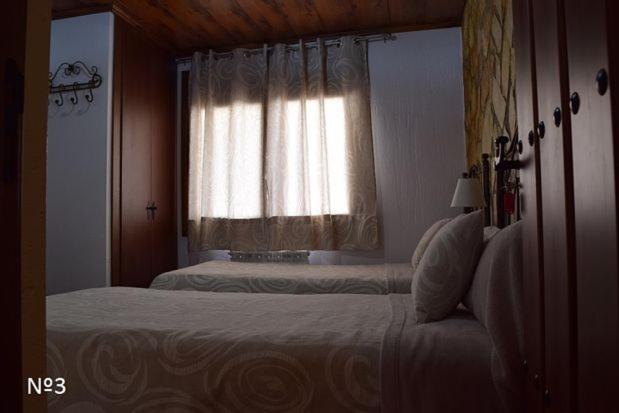 Cama o camas de una habitación en Los Ayales