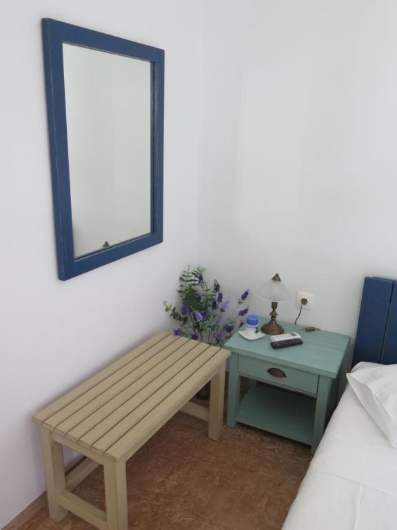 Postel nebo postele na pokoji v ubytování Kaminaki Amorgos