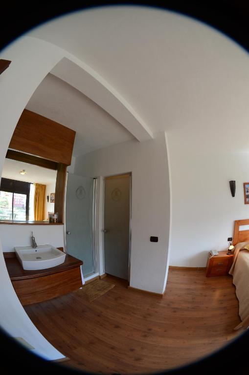 Łóżko lub łóżka w pokoju w obiekcie Hotel Rural Bentor