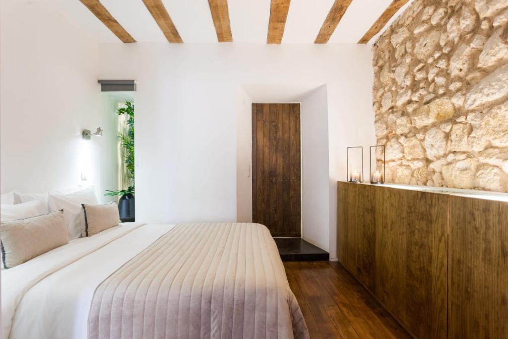 Postel nebo postele na pokoji v ubytování Living Bairro Alto II