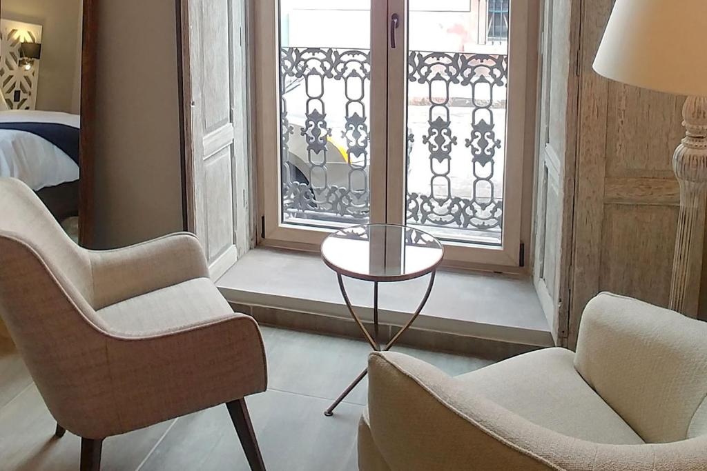 Posezení v ubytování Hotel Casa Once