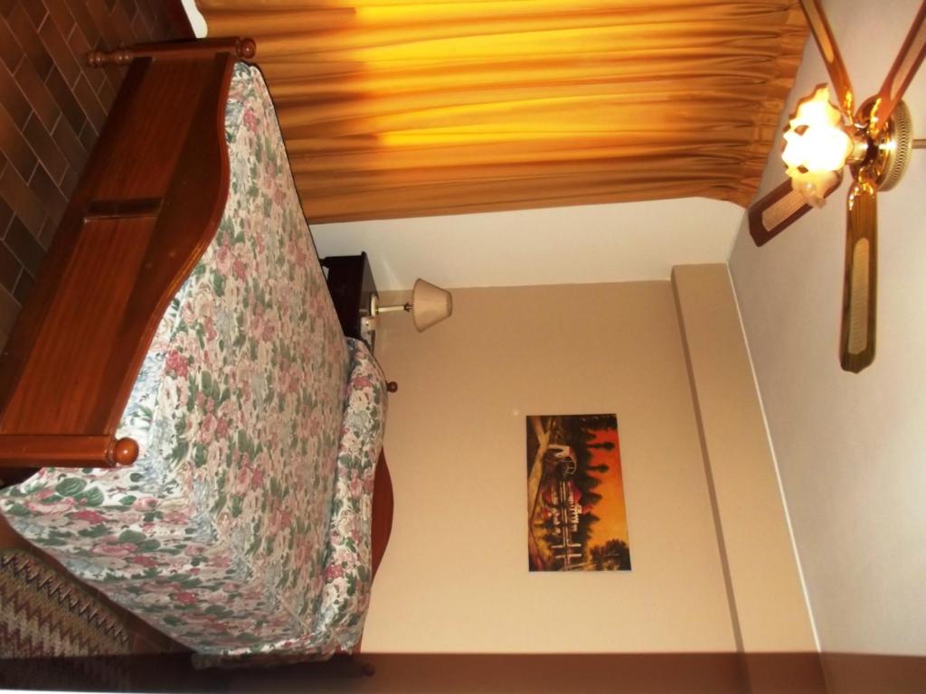 Postel nebo postele na pokoji v ubytování Hostal Gemina