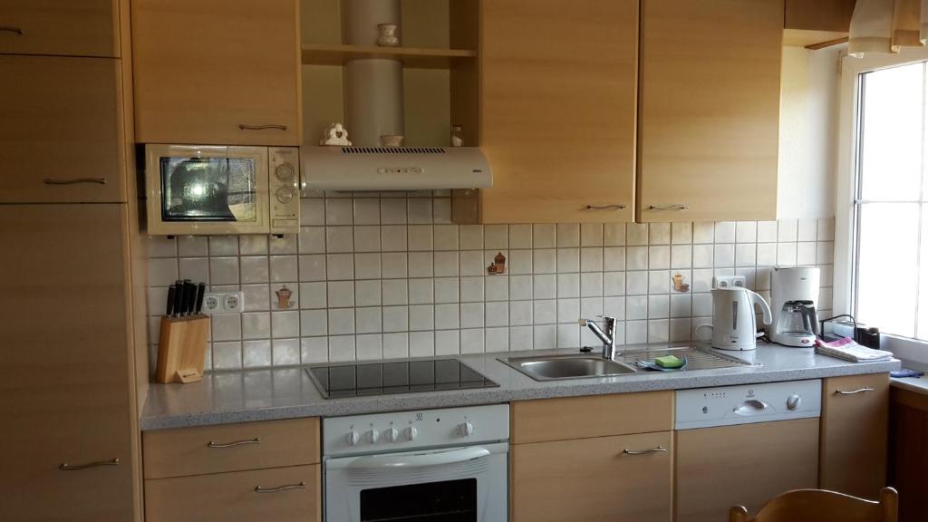 Kuchyňa alebo kuchynka v ubytovaní Knirschenhof