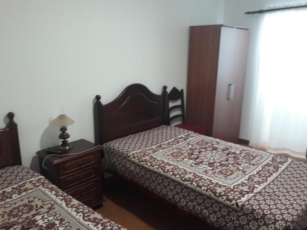 Postel nebo postele na pokoji v ubytování AzoresDream