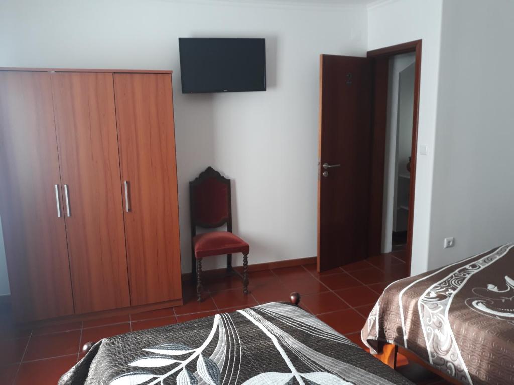 Postel nebo postele na pokoji v ubytování AzoresDream