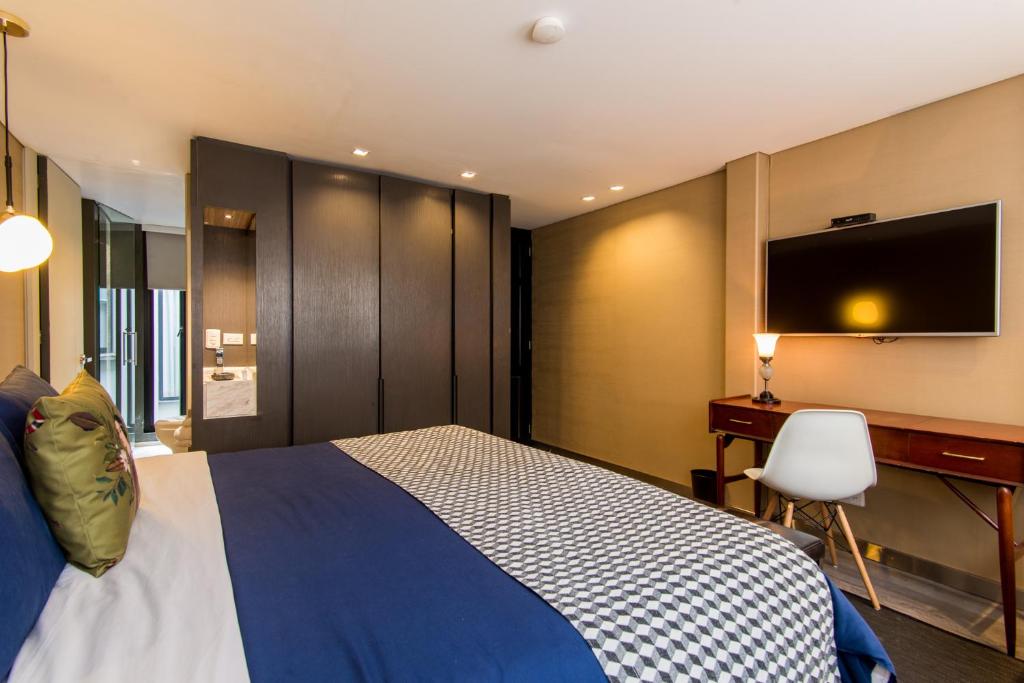 Postel nebo postele na pokoji v ubytování Hotel Regina