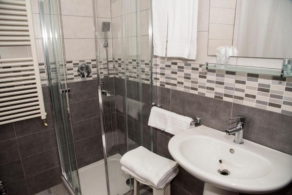 Koupelna v ubytování Hotel Corallo