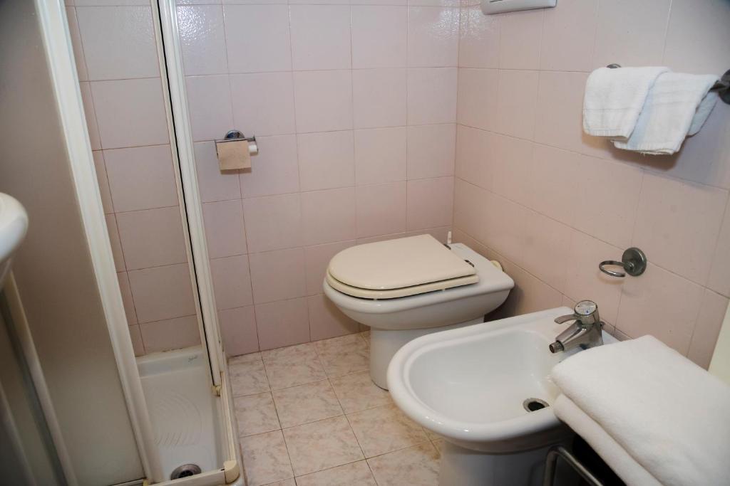 Koupelna v ubytování Hotel Corallo