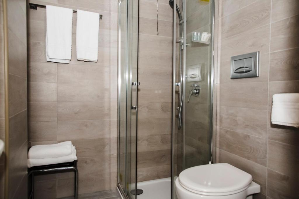 Koupelna v ubytování Hotel Corallo