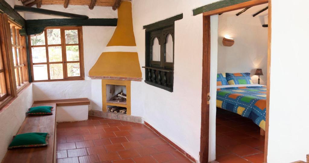 Postel nebo postele na pokoji v ubytování Posada Campestre La Casona
