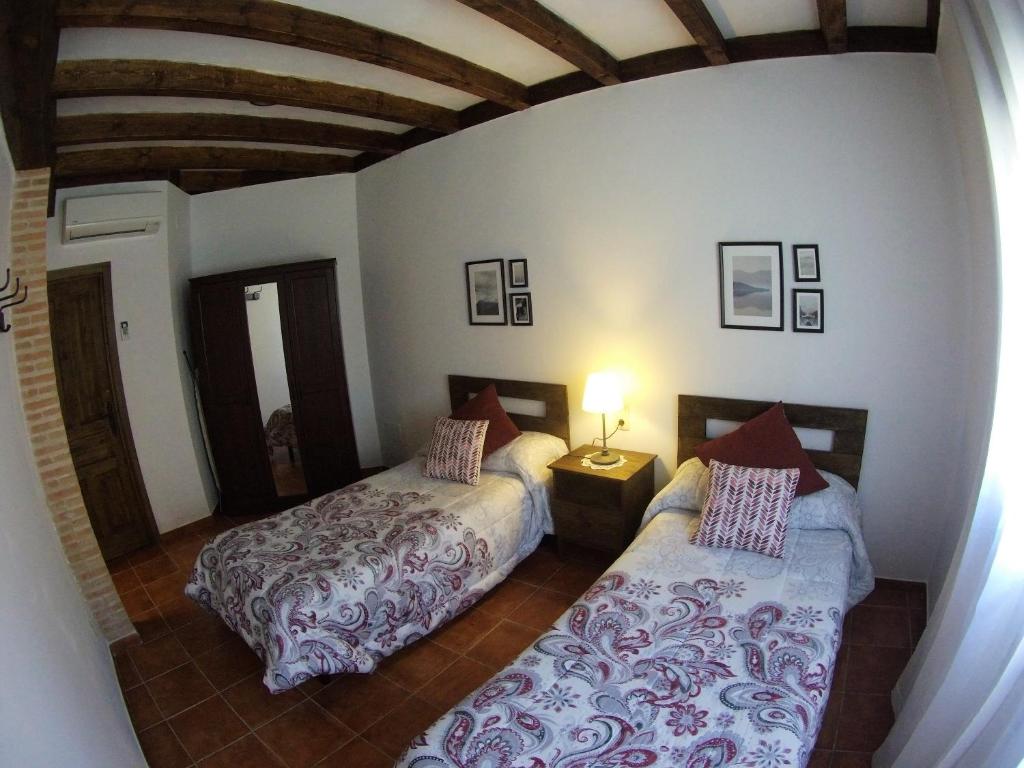 Posteľ alebo postele v izbe v ubytovaní Apartamento los arcos