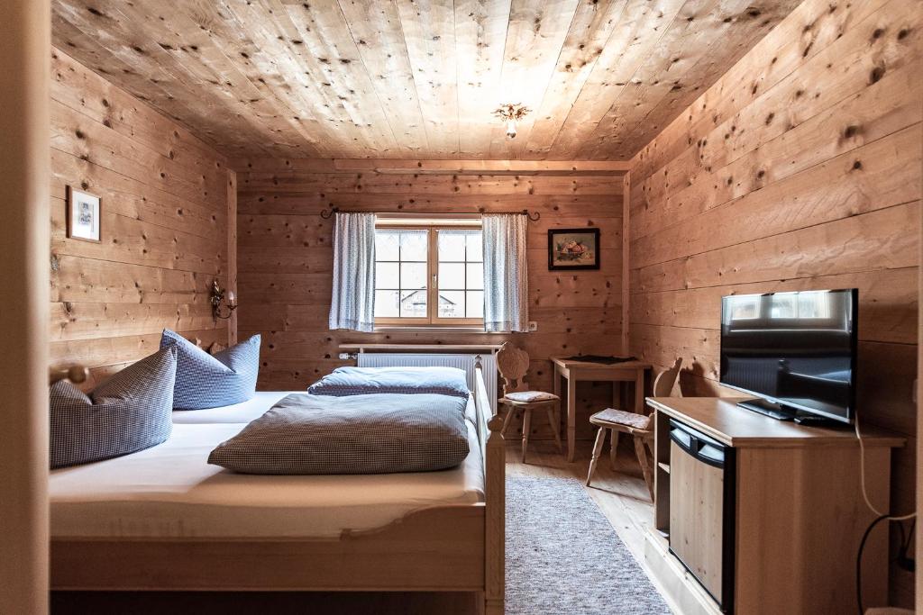 Postel nebo postele na pokoji v ubytování Gämsle Hotel, Wirtshaus & mehr