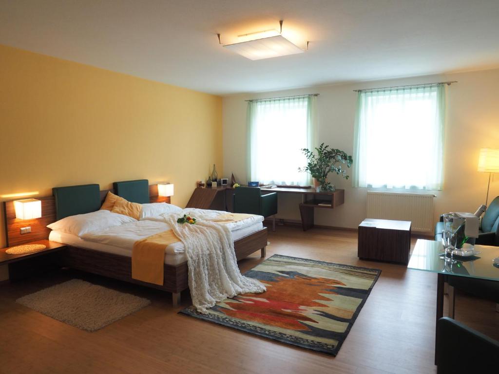 Postel nebo postele na pokoji v ubytování Hotel Die Residenz