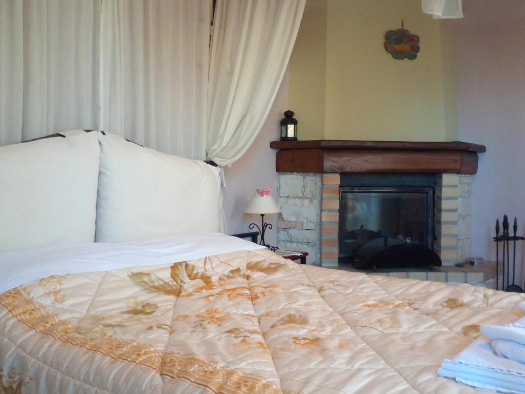 Postel nebo postele na pokoji v ubytování Guesthouse Kalosorisma