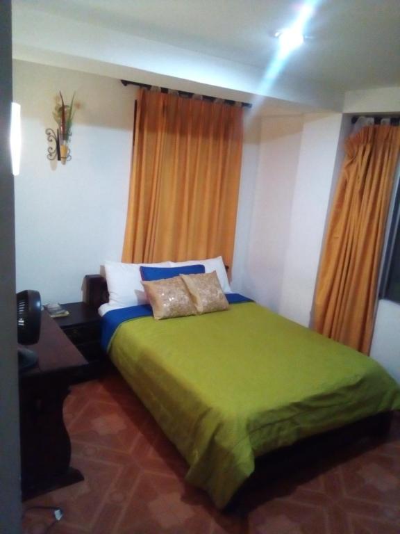 Postel nebo postele na pokoji v ubytování Hotel Royal Suite