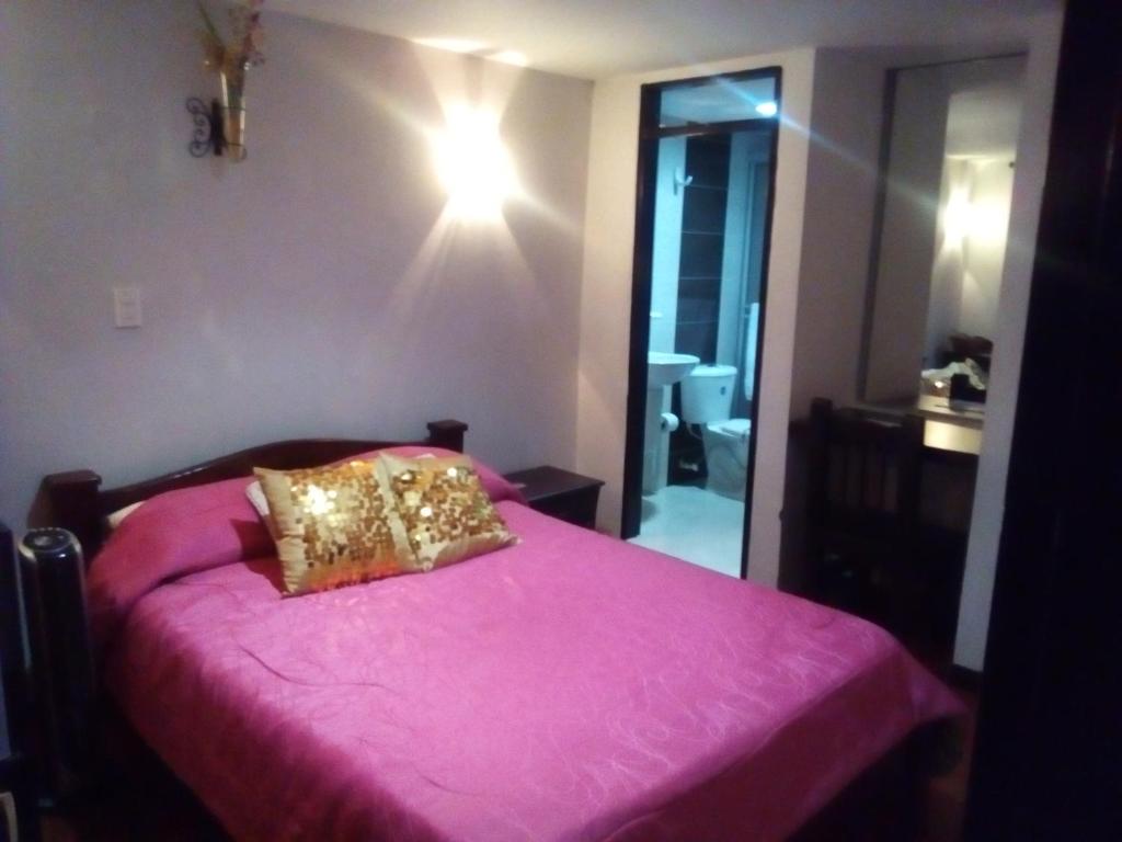 Postel nebo postele na pokoji v ubytování Hotel Royal Suite