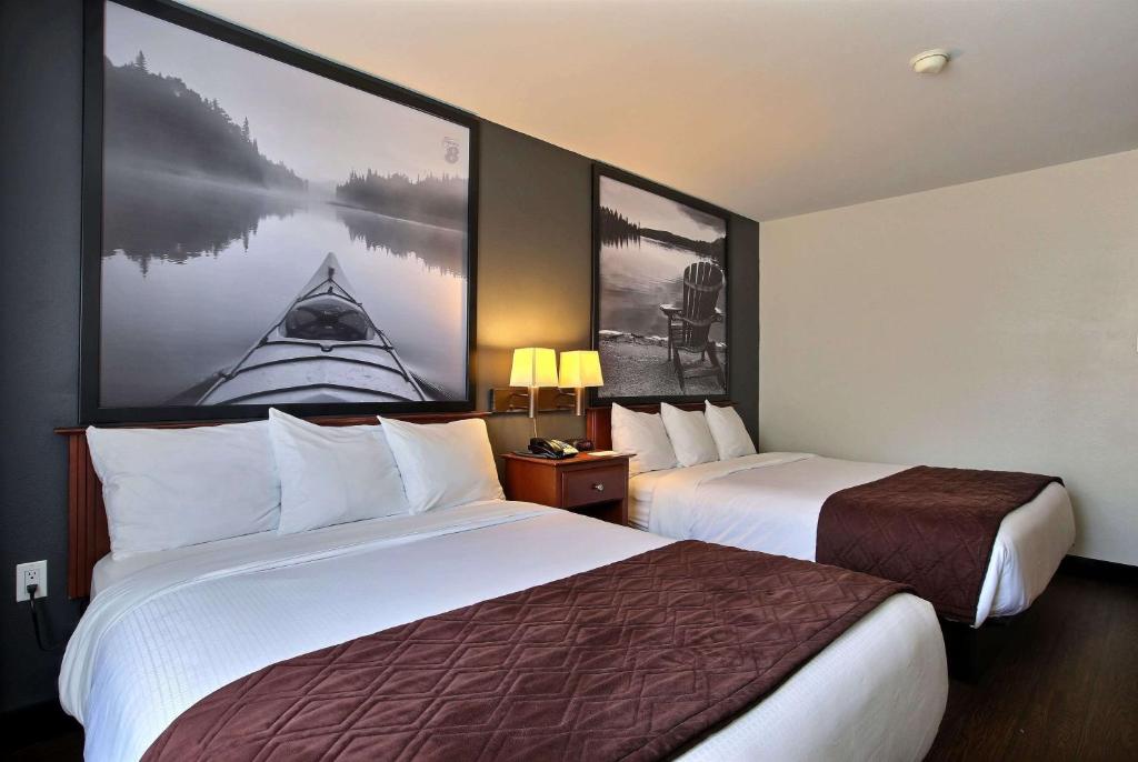 Postel nebo postele na pokoji v ubytování Super 8 by Wyndham Trois-Rivieres