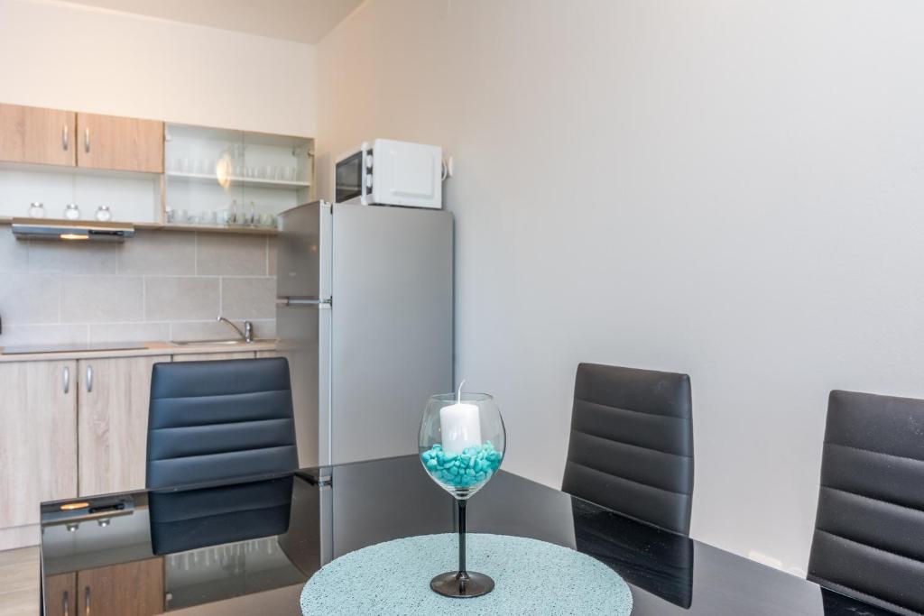 Kuchyň nebo kuchyňský kout v ubytování Pasko 2 modern furnished ap for 7