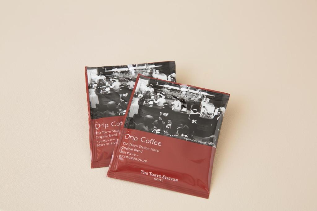 two brochures for a dry café on a wall at The Tokyo Station Hotel in Tokyo