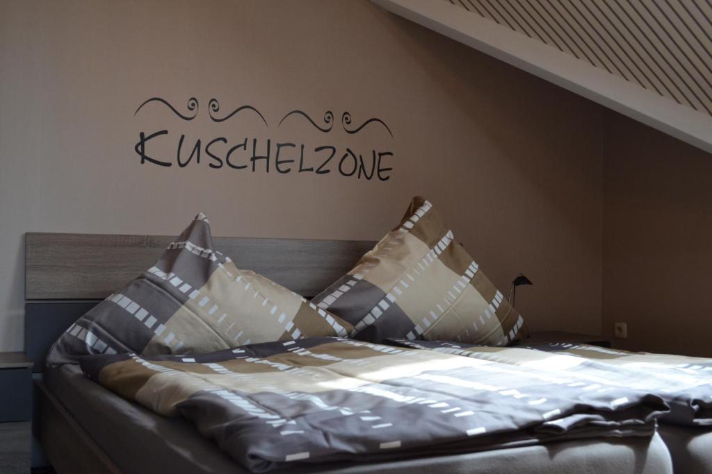 Postel nebo postele na pokoji v ubytování Gästehaus Klein
