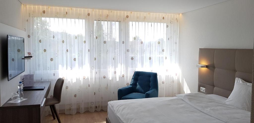 Postel nebo postele na pokoji v ubytování Hotel Al Ponte
