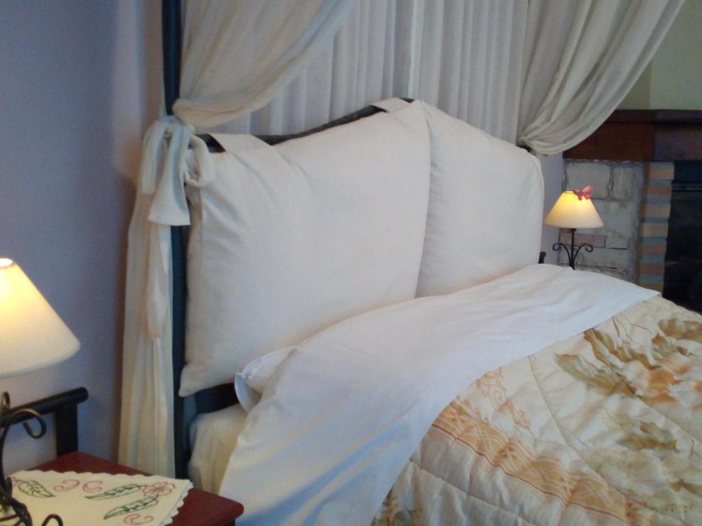 Postel nebo postele na pokoji v ubytování Guesthouse Kalosorisma