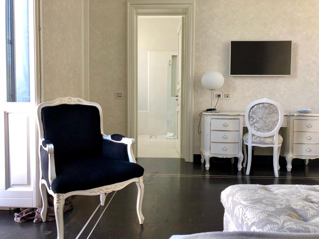 TV a/nebo společenská místnost v ubytování Palazzo Favacchio - Patanè