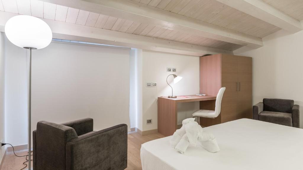 Katil atau katil-katil dalam bilik di Scicli Albergo Diffuso
