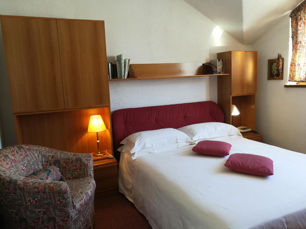 Postel nebo postele na pokoji v ubytování Hotel Europa