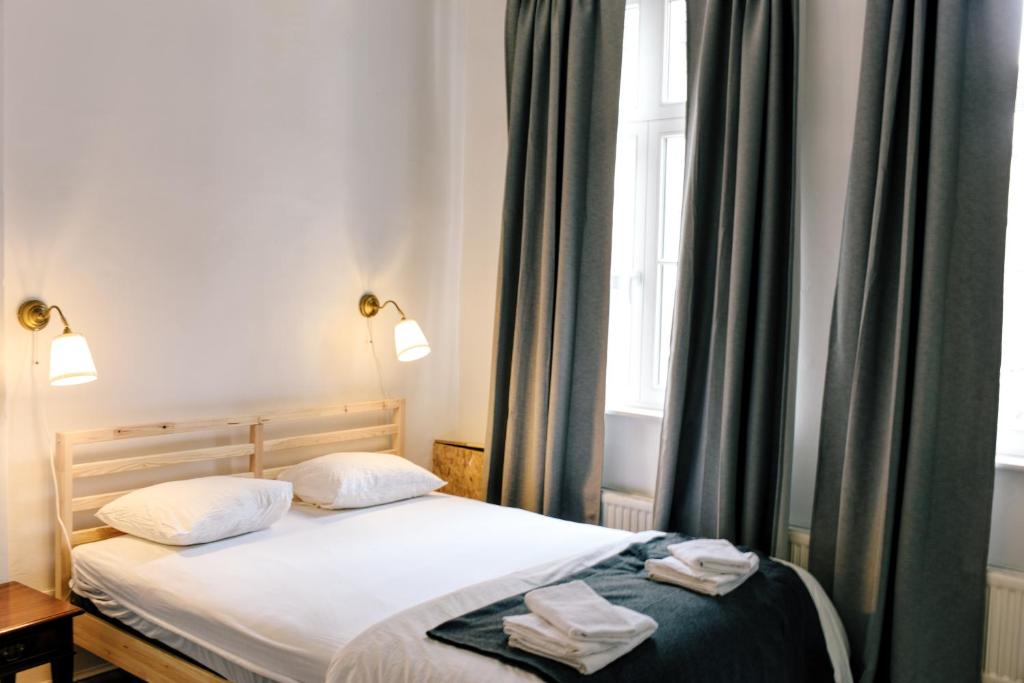 Postel nebo postele na pokoji v ubytování BED Collège