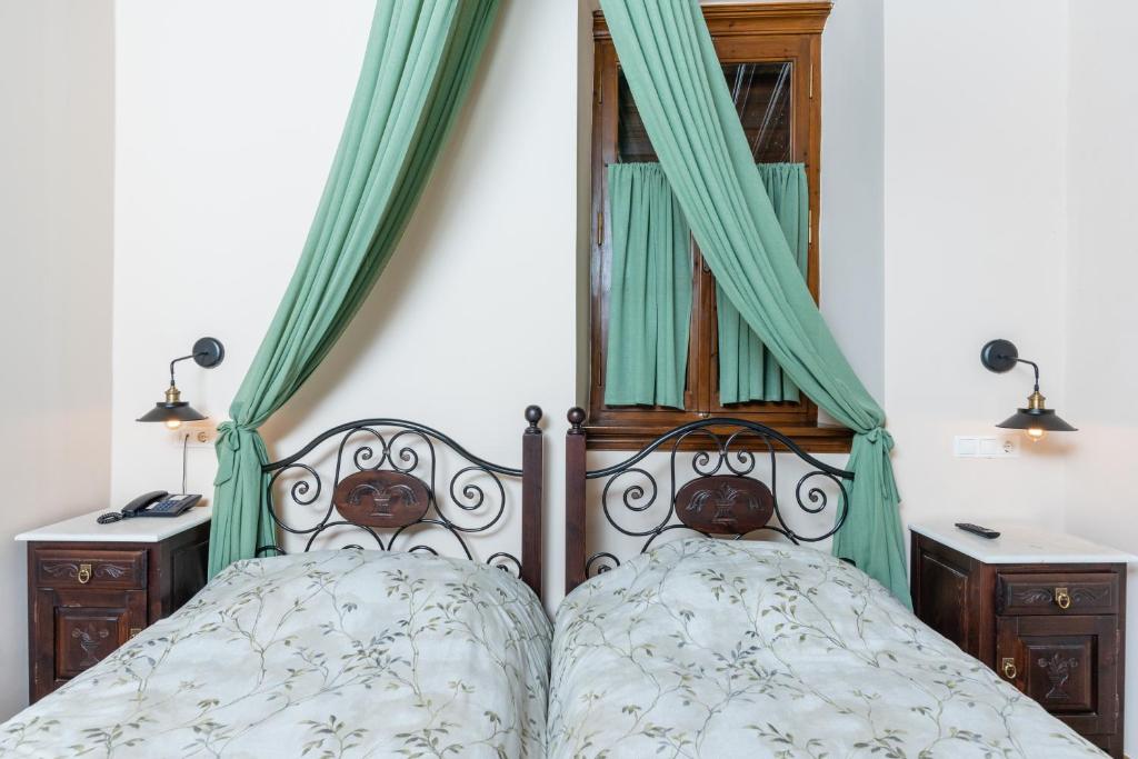 Posteľ alebo postele v izbe v ubytovaní Kaza Guesthouse
