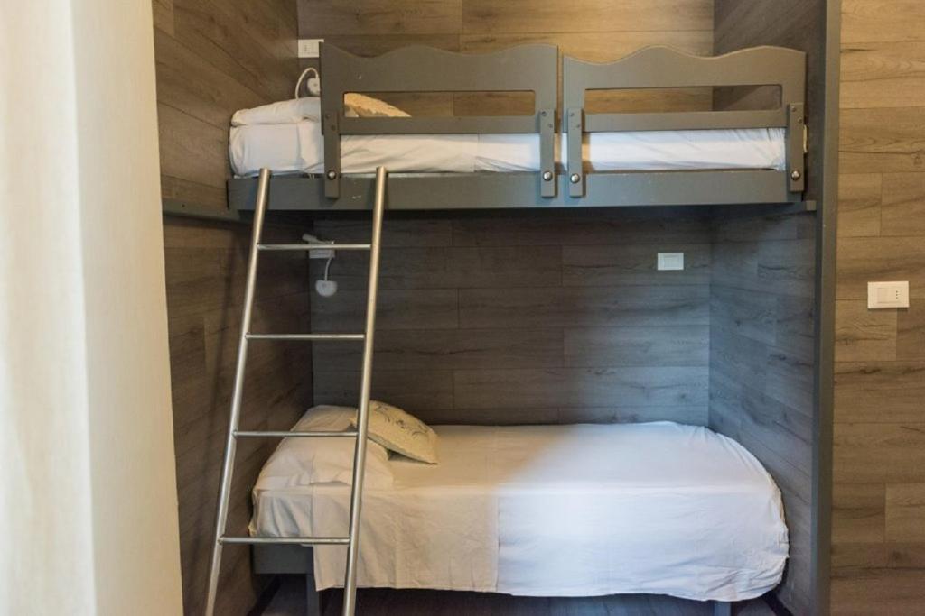 Postel nebo postele na pokoji v ubytování Hotel Royal
