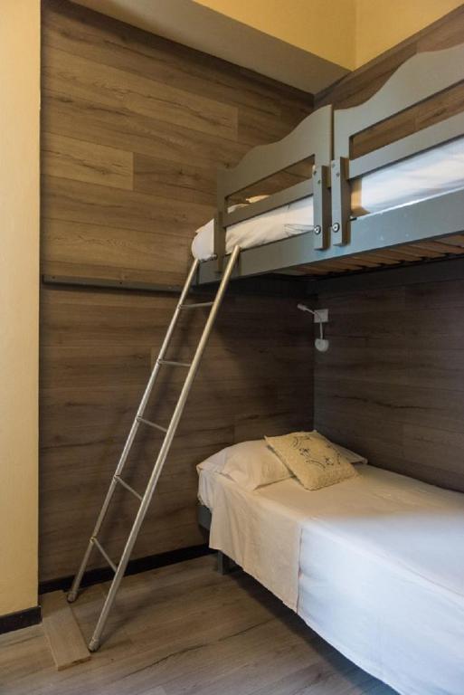 Postel nebo postele na pokoji v ubytování Hotel Royal