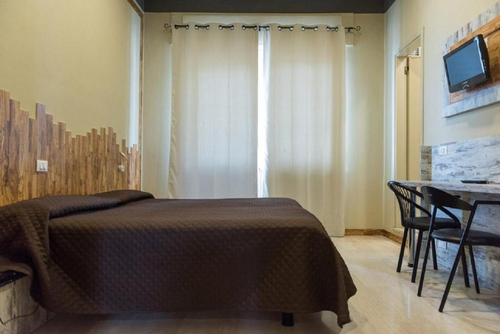 TV a/nebo společenská místnost v ubytování Hotel Royal