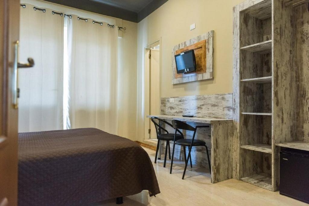 TV a/nebo společenská místnost v ubytování Hotel Royal