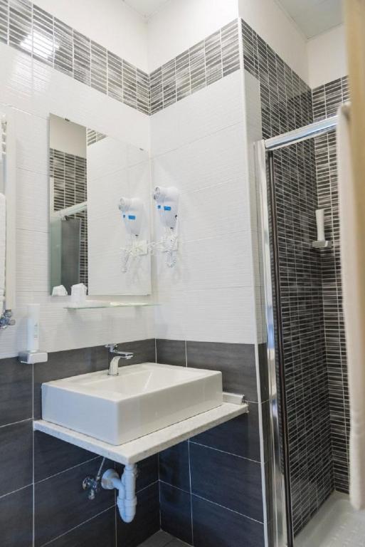 Koupelna v ubytování Hotel Royal