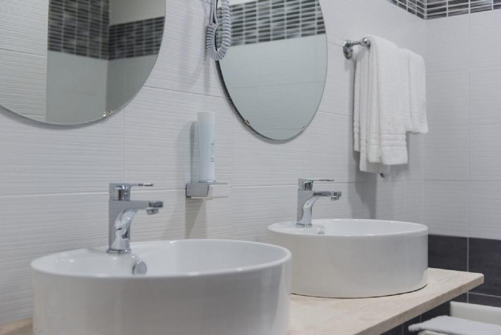Koupelna v ubytování Hotel Royal