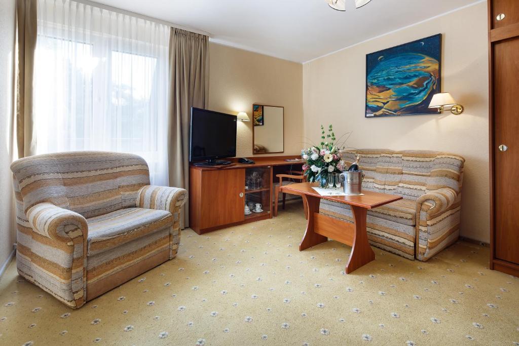 TV a/nebo společenská místnost v ubytování Hotel Wodnik