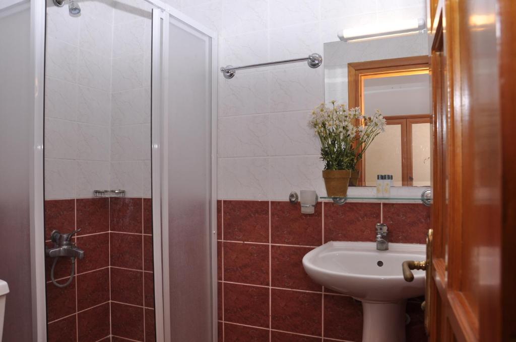 Koupelna v ubytování Latino Hotel