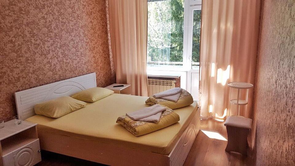 Park Hotel Lesnye Dali房間的床