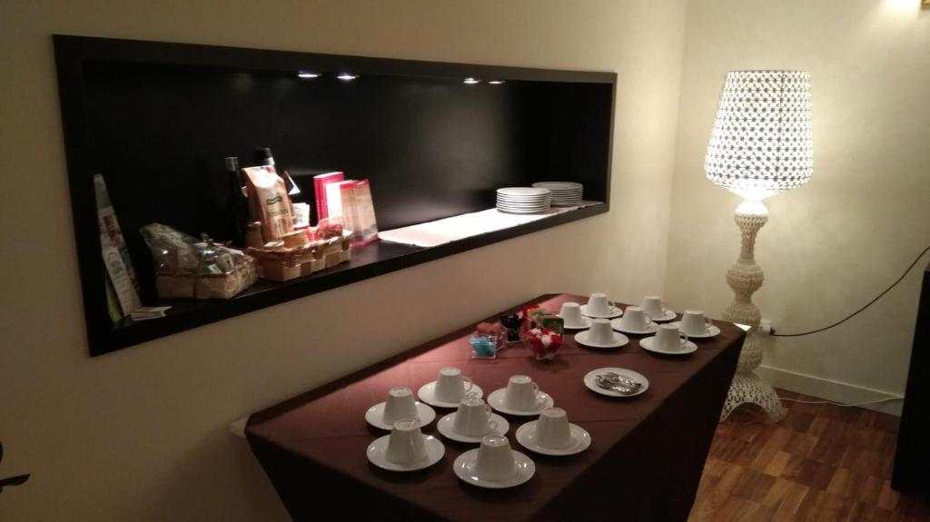 Příslušenství pro přípravu čaje a kávy v ubytování Torrione Hotel
