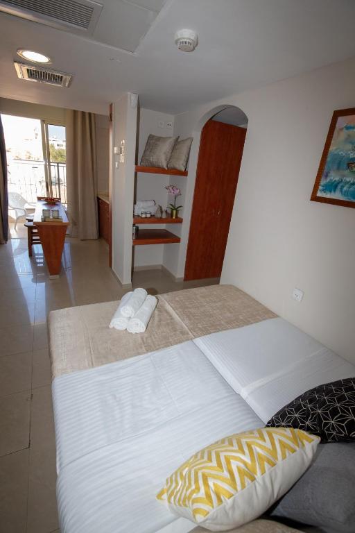 Postel nebo postele na pokoji v ubytování Motel Aviv