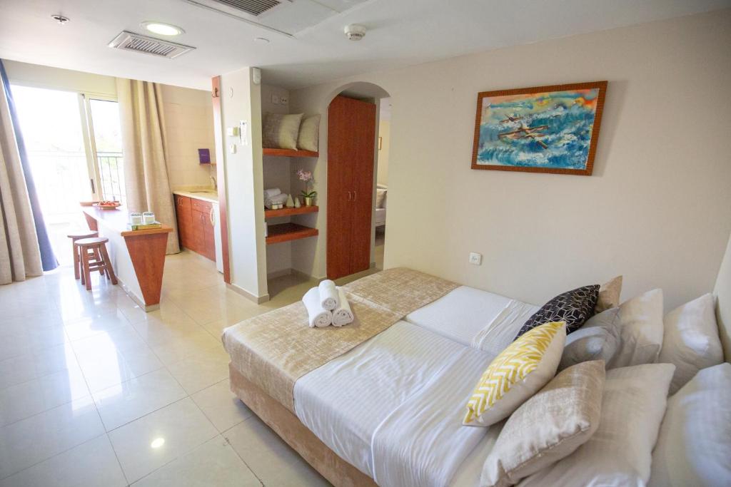 Postel nebo postele na pokoji v ubytování Motel Aviv