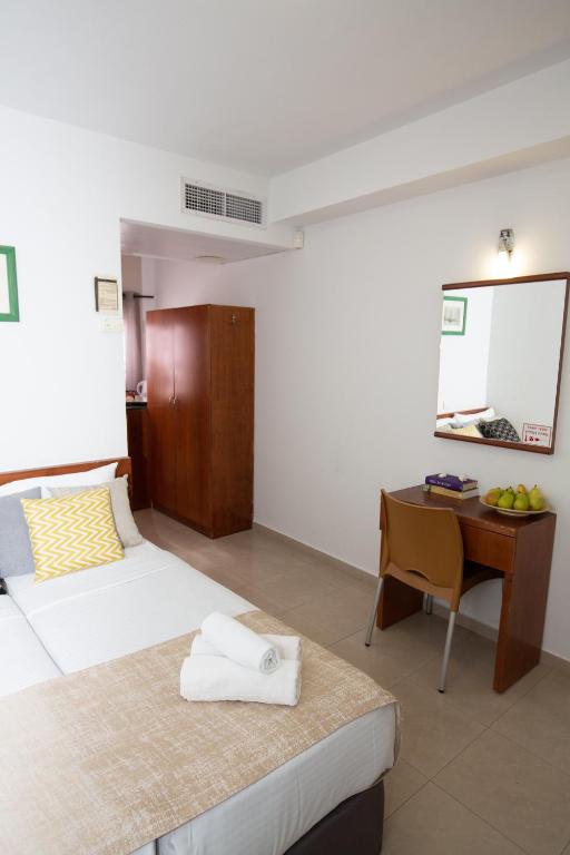 Postel nebo postele na pokoji v ubytování Motel Aviv
